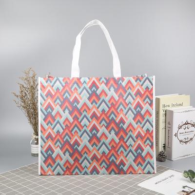 China Factory direct sales pp nonwoven gift bag eco-friendly color printed custom advertising tote bag for sale