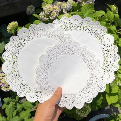 China Sustainable Hand Account Raw Material Lace Cake Paper Lace Cushion for sale