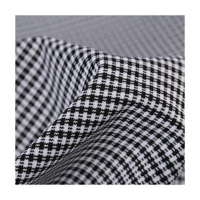 China New Design Elastic Houndstooth Style Brushed Single Jersey Knitted Print Polyester Spandex Dty Elastic Plover Fabric for sale