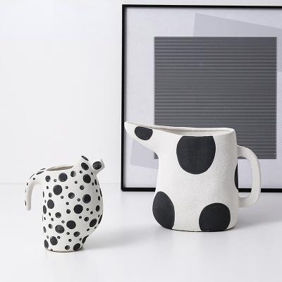 China Wholesale new arrival luxury creative black and white cup stocked spots small form ceramic flower vases for home decor for sale