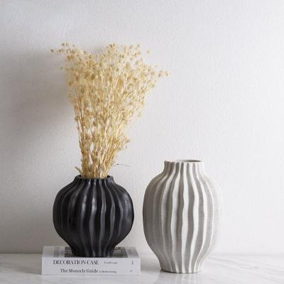 China New Stocked Trendy Home Living Room Origami Ware Decor Decorative Pieces Of White Vase / Black Ceramic Vases for sale