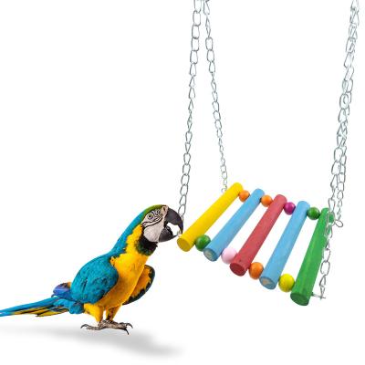 China Amazon Hot Sale Wood Cage Bird Nest Swing Pine Parrot Bird Stocked Hanging Toys Stand Perch Bird Toys for sale