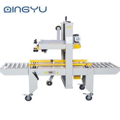 China Semi Automatic Carton Box Food Adhesive Tape Sealer Folding Sealing Packing Machine for sale