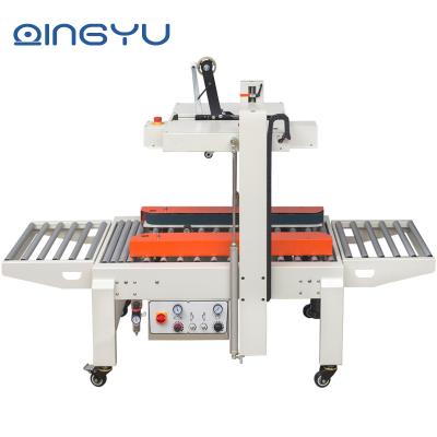 China FXA-6050 Automatic Side Carton Box Food Drive Top&Sealing Tape Machine for sale