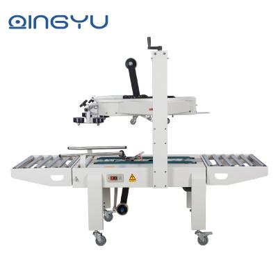 China Semi Automatic Food Carton Box Packaging Adhesive Tape Folding Sealing Machine for sale