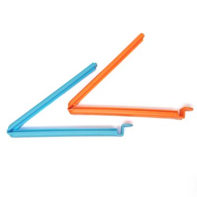 China Sustainable plastic storage board clip, plastic bag sealer stick, sealer clips for food package for sale