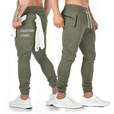 China Anti-Wrinkle Custom LOGO Men Gym Fitness Sport Wear Trousers And Trouser Gaiters Jogging Track Casual Men's Tight Workout With Pockets for sale