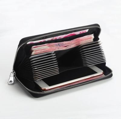 China Luxury Handmade Black Top Leather Woven Wallet Long Grain Zipper Wallet Credit Card Holder Clutch for sale