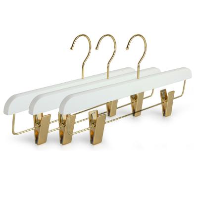 China Wholesale Luxurious Flat Adult Non Slip White Wooden Soft Pants Hangers With Metal Clips for sale