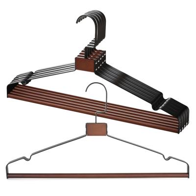 China Space Saving New Design Luxury Black Metal Wire Garment Hanger With Wooden Trouser Bar for sale