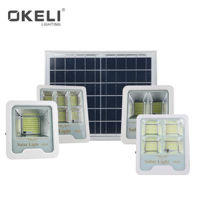 China Garden OKELI High Brightness 50W 100W 200W 300W IP65 IP65 Outdoor Solar LED Black White Flood Light for sale