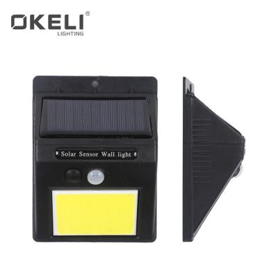 China OKELI Home Power Radio Solar Light Portable Waterproof Optical Inductor Motion Sensor SOLAR Fill Light For Outdoor Garden for sale