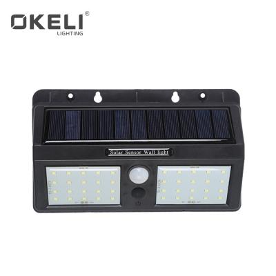 China OKELI Smart Home Wall Waterproof Power Motion Sensor LED Solar Garden Light for sale