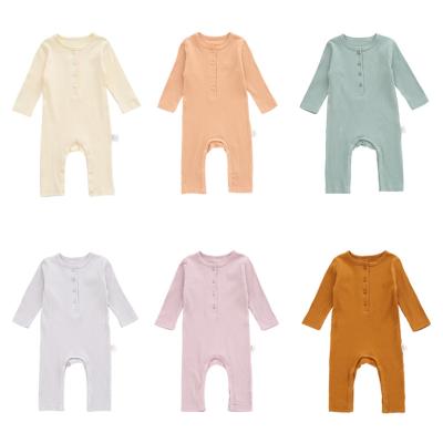 China Long Sleeve Baby Rompers Solid Color Cotton Baby Rompers Regular Instant Button Jumpsuit Baby Rompers for sale