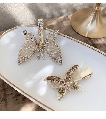 China Luxury Sweet Fashion Hair Clips Accessories Beads Rhinestone Diamond Rhinestone Hair Clip Metal Wings Hair Clips Gold Butterfly Hair Clips for sale