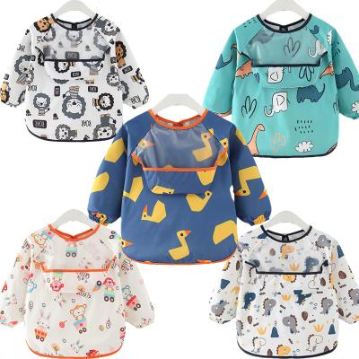 China Antibacterial Ready To Ship Long Sleeves Baby Bibs Shirt Apron Food Catcher Pocket Soft Machine Washable Kids Aprons for sale