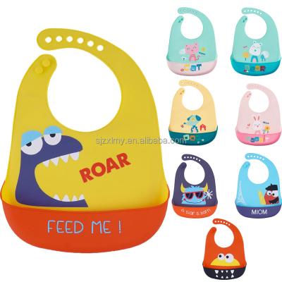 China Antibacterial Baby Feeding New Style Food Grade Cartoon Pattern Waterproof Silicone Baby Bib Set for sale