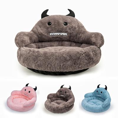 China Breathable Pet Supplies Creative Warm Dog Cat Bed Sofa Small Monster Design Pet Bed Mattress For Winter for sale