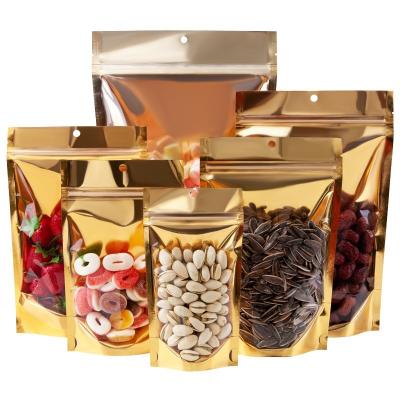 China Hot Sale Tear Notch Gold Aluminum Foil Zip Lock Moisture Proof Holder Up Packaging Pouches Bag For Candy Cafe Food Storage for sale