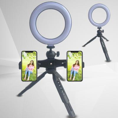 China Mini Wholesale Selfie Ring Light Beauty 6 Inch With Multifunctional Phone Holder Tripod Stand for sale