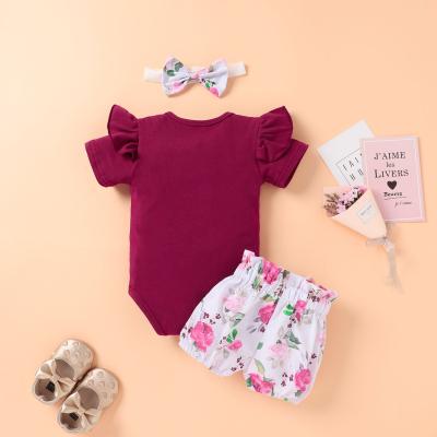 China Europe and America spring dark red flight sleeve / summer new product embroidered love shorts sleeve romper + short belt shorts spot printed for sale