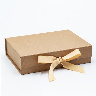 China Recyclable Custom Corporate Gift Wrapping Magnetic Folding Brown Kraft Paper Gift Box With Ribbon for sale