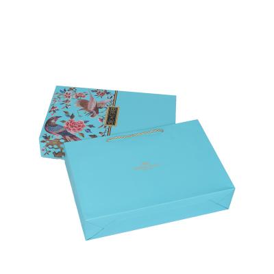 China Recycled Materials Customized Portable Blue Printing Gift Box Magnet Clamshell Moon Cake Dessert Packaging Box for sale