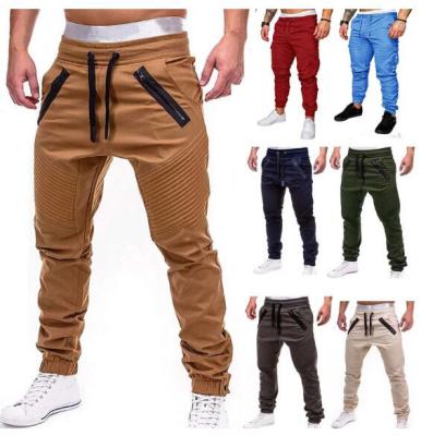 China New QUICK DRY Men's Casual Joggers Pants Multi Hip Hop Harem Pencil Pants Sportswear Pants Pocket Solid Slim Cargo Sweatpants Male for sale