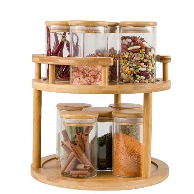 China Sustainable Rotary Bamboo Spice Rack Bamboo Storage Container Bamboo Seasoning Container Condiment With Glass Jars for sale