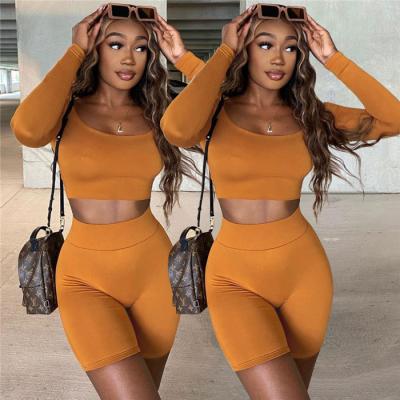 China 2021 Autumn QUICK DRY fashion women long sleeve crop tops and bodycon short pants 2 Pcs sports yoga sets for sale