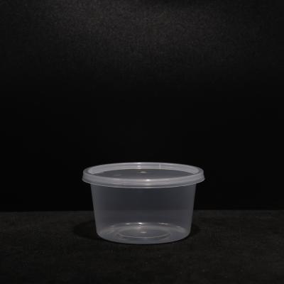 China 440 ml de caja de comidas apilada a prueba de fugas de material PP de forma redonda para almacenamiento de alimentos en venta