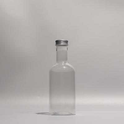 China Round Shape Screw On Lid Plastic Bottles PET Material For Cold Juice for sale