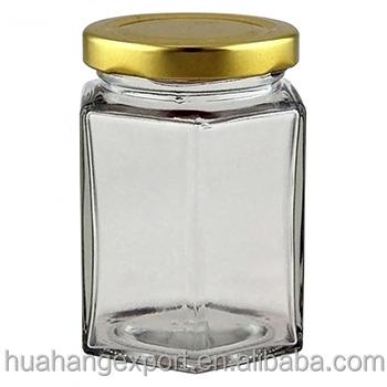 China Viable Hot Selling 8oz/16oz/32oz Hexagon Shape Wholesale Honey Glass Jar for sale