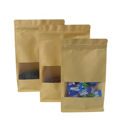 China Recycled materials kraft paper stand up bag food packaging doypack with frosted window for sale