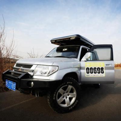 China 4 wheel drive camping moving bedding stored inside automatic roof top tent for sale