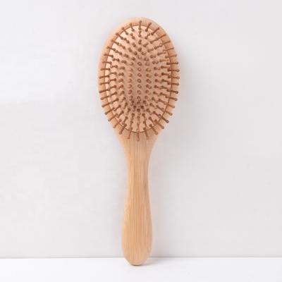 China Cushion Hair Brush Handle Natural Bamboo Hair Brushes Long With Bamboo Pins for sale