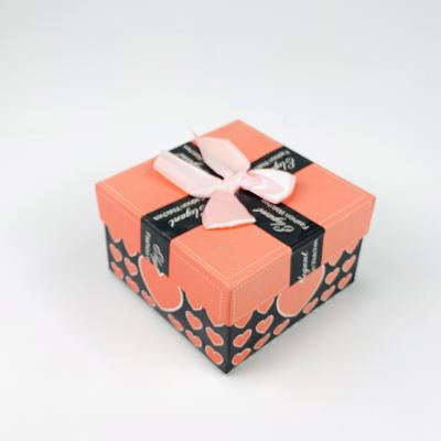 China Groceries Storage Recycled Materials Lipstick Packaging Gift Box With Bow for sale