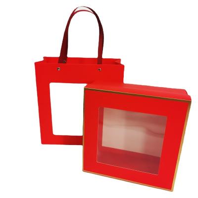 China Top and bottom bag of other gift box Christmas style folding cover large size red paper window transparent clean PVC for sale