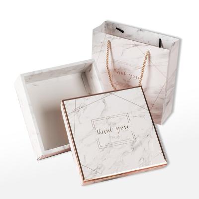 China Handmade Square Tan Ribbon Candy Gift Packaging Paper Boxes For Wedding Party Decor White Paper Bag Paper Box Custom for sale