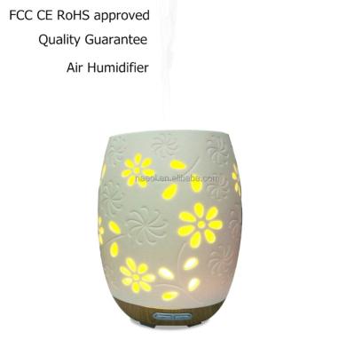 China Smell Cozy Decorations Ceramic Flower Household Essential Aroma Oil Diffuser for sale