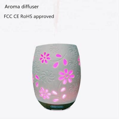 China Smell Comfortable Creative Ultrasonic Electric Ceramic Flower Unique Popular Aroma Diffuser for sale