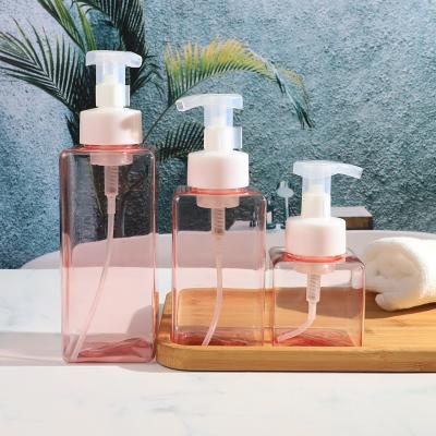 China Idealpak Cosmetic Luxury Square Clear Empty Plastic Bottles Soap Shampoo Conditioner Pink PETG Bottle Pump With Foam Pump for sale