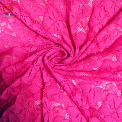 China Viable New Design Nylon Spandex Fuchsia Lilac Flower Lace Fabric For Wedding Dress for sale