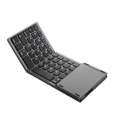 China Waterproof Universal Phone Three System wirelessBluetooth Mini Folding Tablet Keyboard with Touchpad for sale