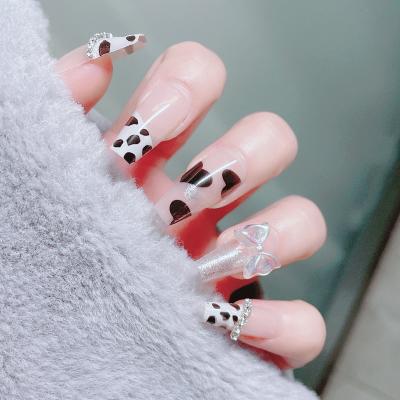 China Easy Apply SanLong Wholesale Price Ballerina Coffin Black And White Spots French Nails Diamond Art Press On Nails Artificial Nails for sale