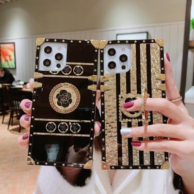 China Anti-fall New Luxury Gold Phantom Flower Glitter Back Cover For iphone 12 pro max square phone case for sale