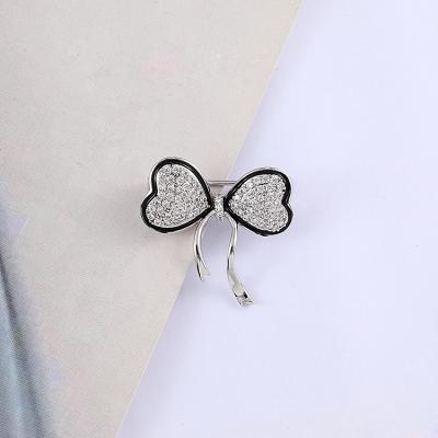 China Ally new good quality fashion exquisite bow tie painted oil listing brooch for women for sale