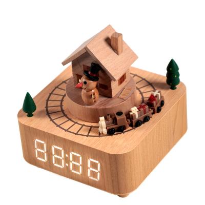 China Orgel KOREAN Custom Christmas Clock BR ​​Industry Dolphin Wooden Musical Boxes Wooden Music Box with Spinning Toy Train and Alarm Clock for sale