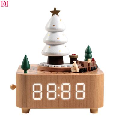 China Orgel KOREAN Custom Christmas Clock BR ​​Industry Dolphin Wooden Musical Boxes Wooden Music Box with Spinning Toy Train and Alarm Clock for sale