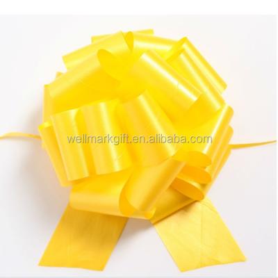 China 8 Inch Tall Floral Yellow Lacquer Ribbon Pom Pom Pull Bow Poly Gift Wrap for sale